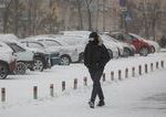 Zasnezene cesty a hmla znizuju viditelnost